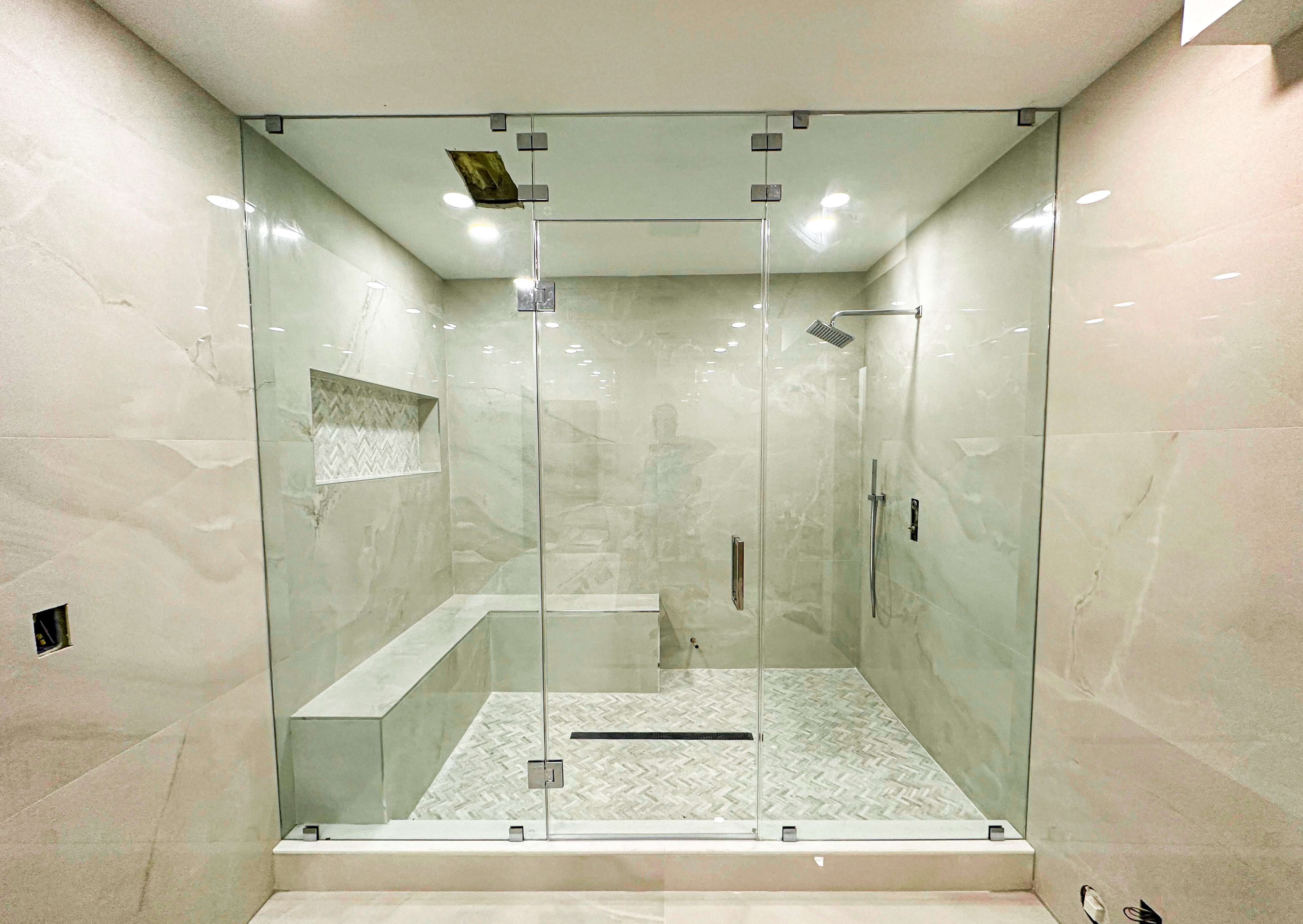 Picture a of a frameless shower door